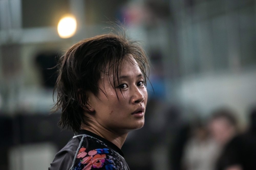 This photo taken on Aug. 15, 2019 shows Myanmar's top woman fighter Bozhena Antoniyar (R) taking part in a training session in Yangon. Myanmar's Bozhena Antoniyar had to side-step conservative parents to take up bare-knuckle fighting, but her stealth paid off on her MMA debut when she knocked out her opponent in a record 24 seconds. — AFP