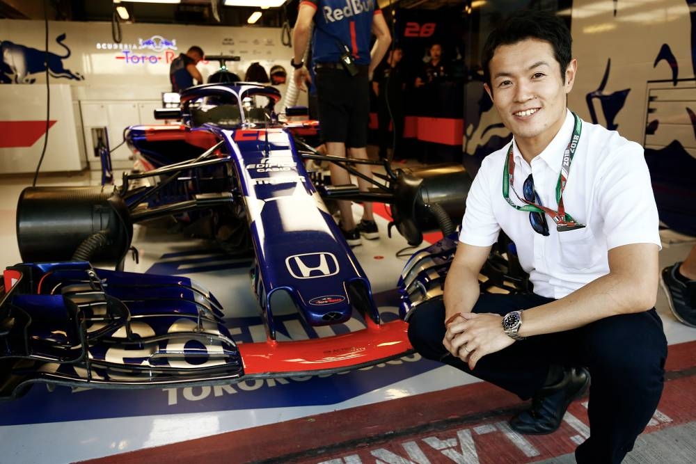 Japanese Naoki Yamamoto next to the Toro Rosso STR13. — Courtesy photo