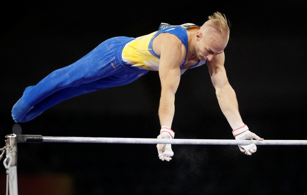 Great Britain's Max Whitlock performs on the horizontal bar during the men's qualifying session at the FIG Artistic Gymnastics World Championships at the Hanns-Martin-Schleyer-Halle in Stuttgart, southern Germany, on Monday. — AFP