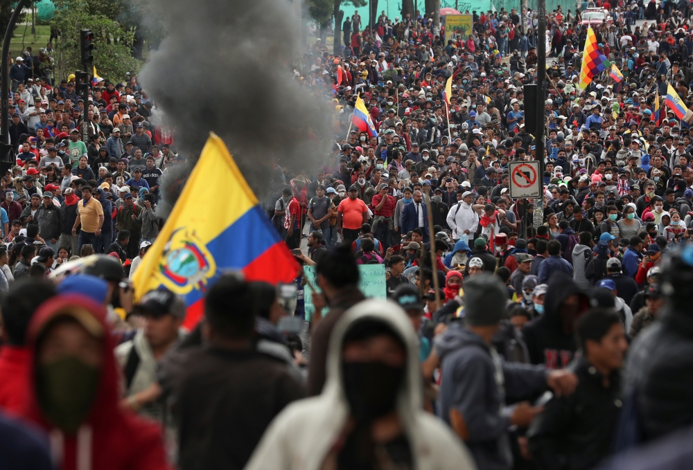 Demonstrators participate in a protest against Ecuador's President Lenin Moreno's austerity measures in Quito, Ecuador, on Tuesday. — Reuters