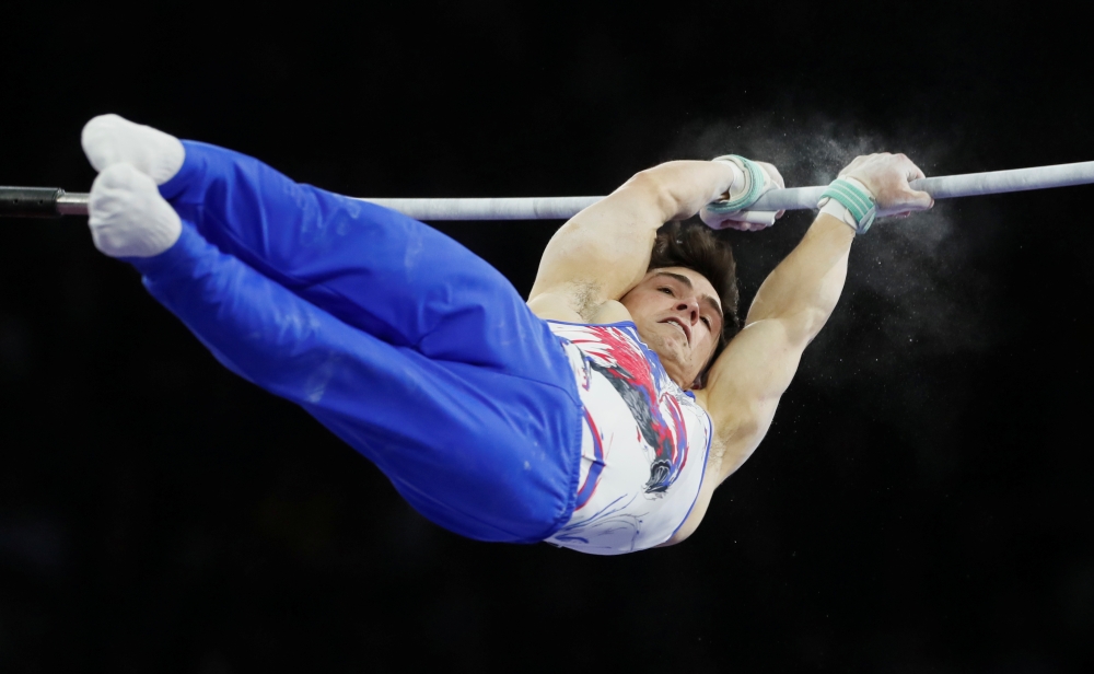 Members of Russia's team react during the men's team final at the FIG Artistic Gymnastics World Championships at the Hanns-Martin-Schleyer-Halle in Stuttgart, southern Germany, onWednesday. — AFP