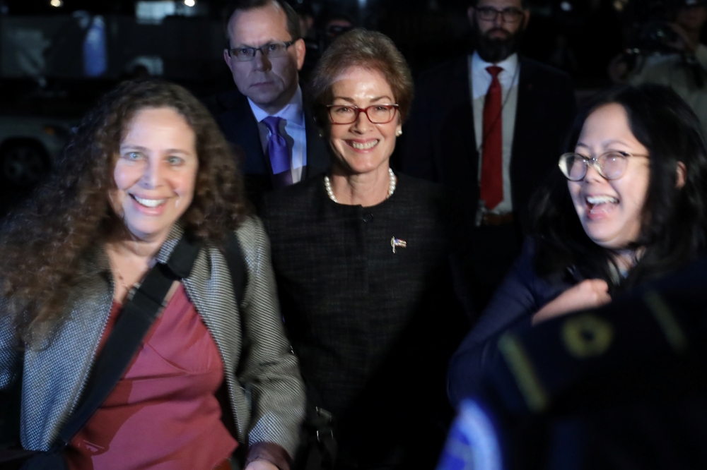 Former U.S. ambassador to Ukraine Marie Yovanovitch smiles as she departs after testifying in the U.S. House of Representatives impeachment inquiry into U.S. President Trump on Capitol Hill in Washington on Friday. -Reuters