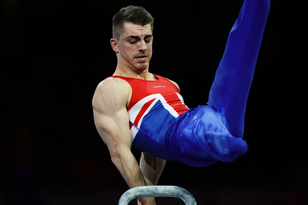 Great Britain's Max Whitlock performs on the pommel horse during the apparatus finals at the FIG Artistic Gymnastics World Championships at the Hanns-Martin-Schleyer-Halle in Stuttgart, southern Germany, on Saturday. — AFP