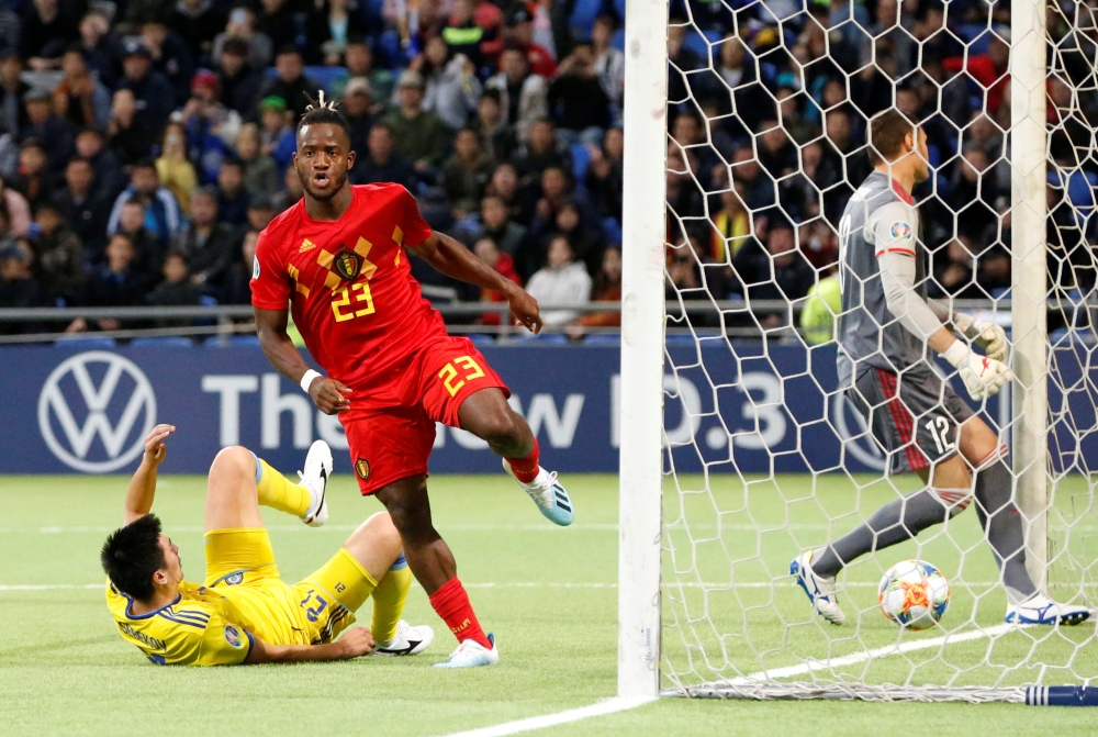 Belgium's Michy Batshuayi celebrates scoring their first goal against Belgium during the Euro 2020 Qualifier Group I match at Astana Arena, Nur-Sultan, Kazakhstan, on Sunday. — Reuters