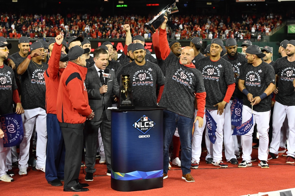 The Washington Nationals celebrate winning game four and the National League Championship Series against the St. Louis Cardinals at Nationals Park on in Washington, DC, on Tuesday. — AFP