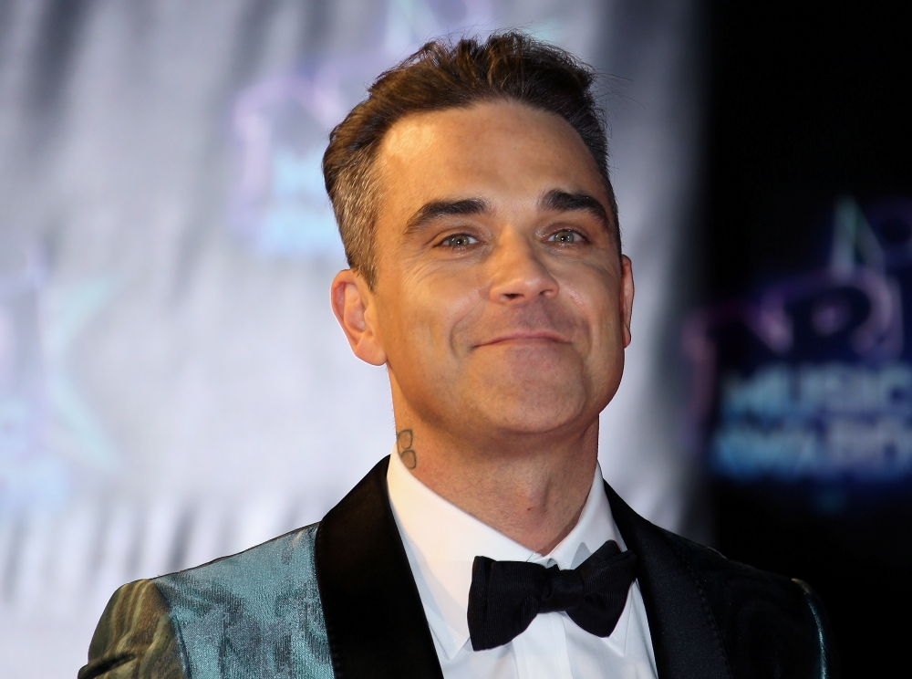 Singer Robbie Williams arrives to attend the NRJ Music Awards ceremony at the Festival Palace in Cannes, France, in this Nov. 12, 2016 file photo. — Reuters