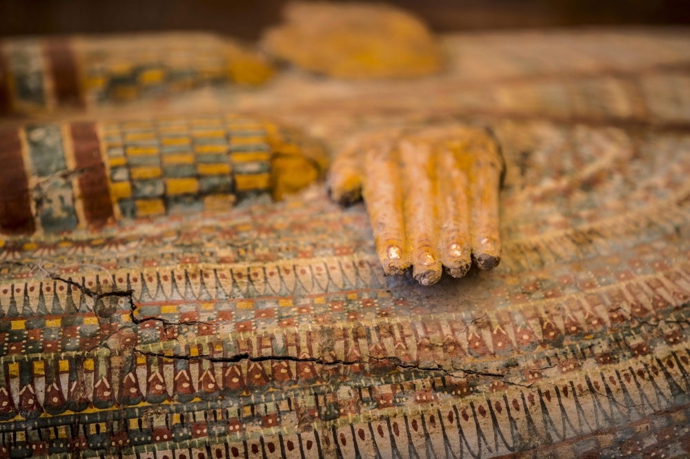 Photographs show details of sarchphagus displayed in front of Hatshepsut Temple in Egypt's valley of the Kings in Luxor. Egypt revealed a rare trove of 30 ancient wooden coffins that have been well-preserved over millennia in the archeologically rich Valley of the Kings in Luxor. — AFP photos
