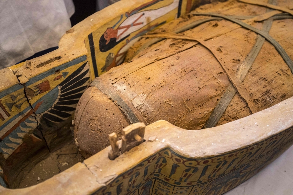 Photographs show details of sarchphagus displayed in front of Hatshepsut Temple in Egypt's valley of the Kings in Luxor. Egypt revealed a rare trove of 30 ancient wooden coffins that have been well-preserved over millennia in the archeologically rich Valley of the Kings in Luxor. — AFP photos
