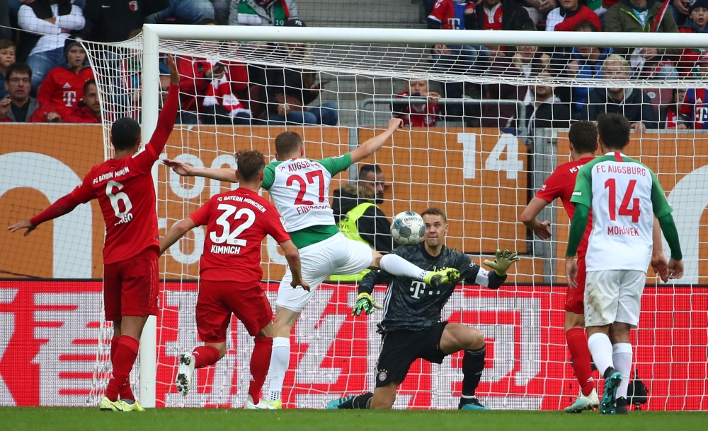 FC Augsburg's Alfred Finnbogason scores their second goal against Bayern Munich at WWK Arena, Augsburg, Germany, on Saturday. — Reuters