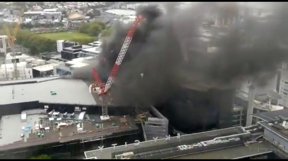 Smoke rises as a fire blazes at Sky City Convention Centre, which is under construction in Auckland, New Zealand, on Tuesday, in this still image taken from video obtained from social media. — Reuters
