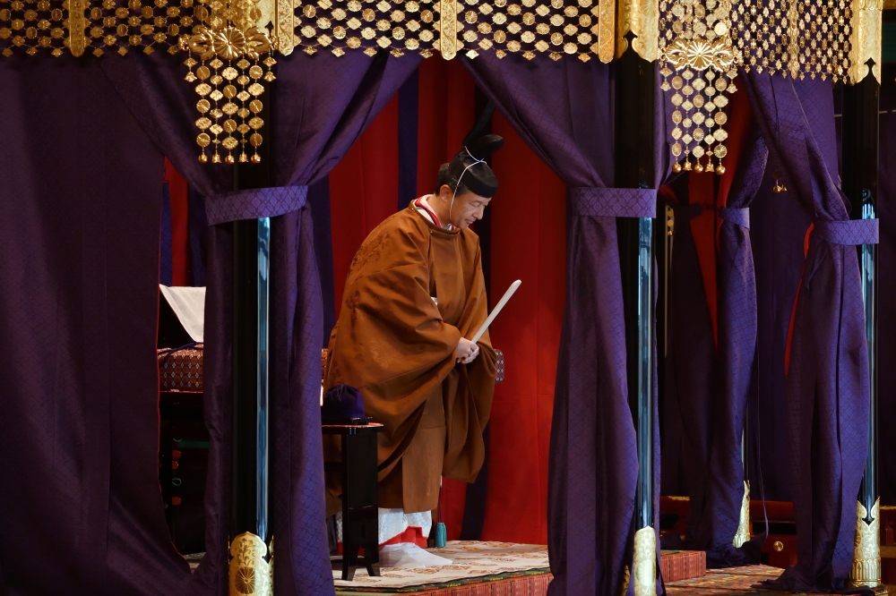 Japan's Emperor Naruhito attends the enthronement ceremony where he officially proclaims his ascension to the Chrysanthemum Throne  at the Imperial Palace in Tokyo, Japan, on Tuesday. — Reuters