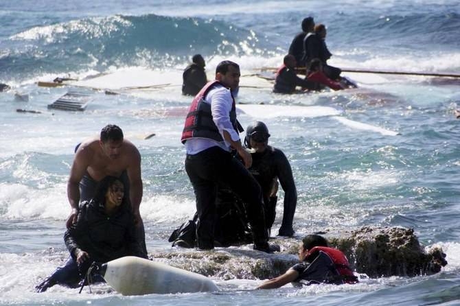 Migrants, trying to reach Greece, are rescued by members of the Greek Coast guard and locals near the coast of the southeastern island of Rhodes, in this file photo. — Reuters
