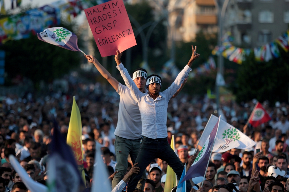 Supporters of the pro-Kurdish Peoples' Democratic Party (HDP) wave party flags during a peace day rally in Diyarbakir, Turkey, in this Sept. 1, 2019 file photo. — Reuters