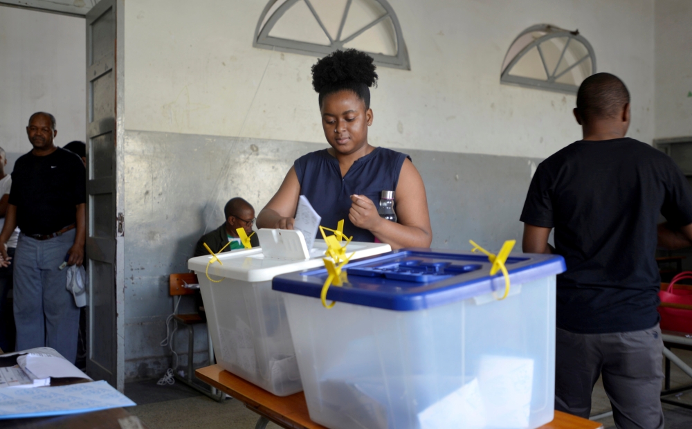  A woman casts her vote during presidential, legislative and provincial elections in Maputo, Mozambique, in this Oct. 15, 2019 file photo. — Reuters