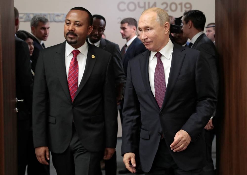 Russian President Vladimir Putin and Ethiopian Prime Minister Abiy Ahmed meet on the sidelines of the Russia-Africa Summit and Economic Forum in Sochi, Russia October 23, 2019. Sergei Chirikov/Pool via REUTERS