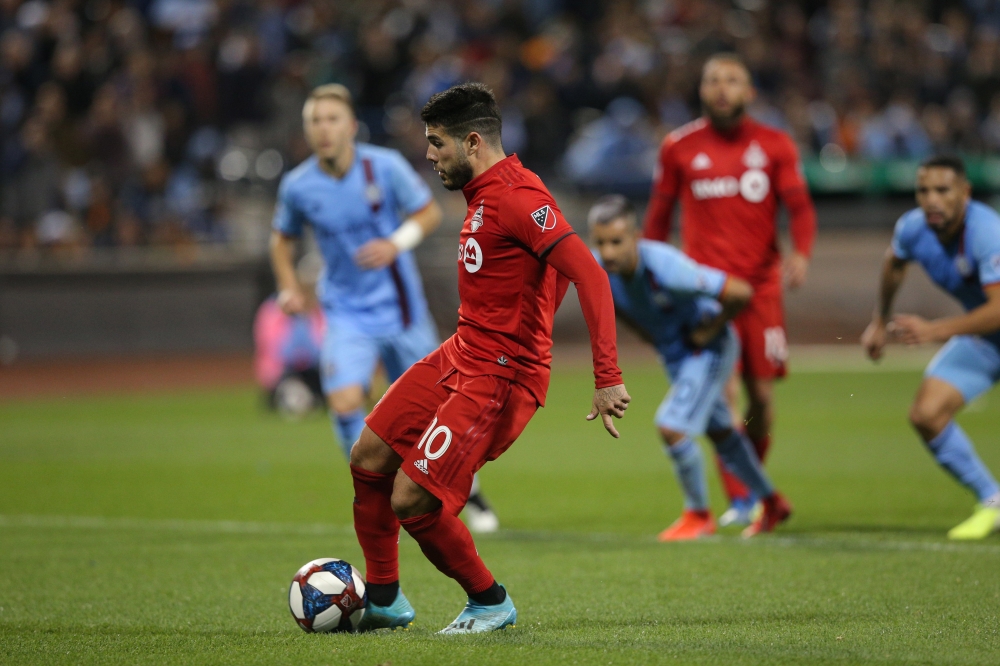 Toronto FC midfielder Alejandro Pozuelo (10) scores the game winning goal against New York City FC on a penalty kick during the second half at CitiField. — Reuters