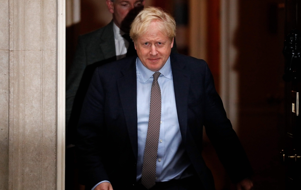 Britain's Prime Minister Boris Johnson leaves 10 Downing Street, central London on Thursday, after taking a political Cabinet meeting. The pound firmed against the dollar and euro on Wednesday as the European Union prepared to grant a further delay to Brexit, averting the prospect of Britain departing the bloc next week without a deal. — AFP