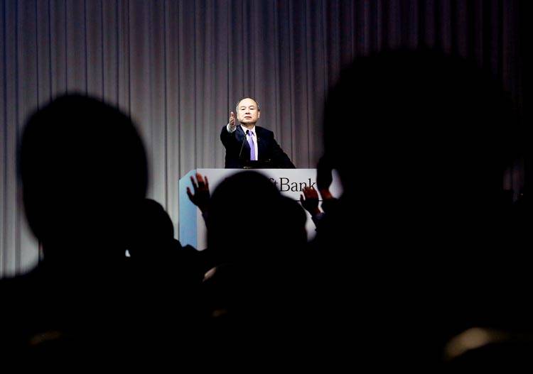 Journalists raise their hands to ask questions to Japan's SoftBank Group Corp Chief Executive Masayoshi Son during a news conference in Tokyo, Japan, Nov. 5, 2018. — Reuters