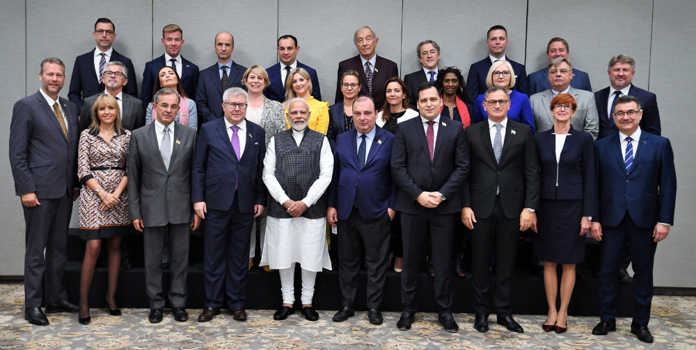 India's Prime Minister Narendra Modi poses for a picture with a delegation of members of the European Parliament after their meeting in New Delhi, India, on Monday. — Reuters