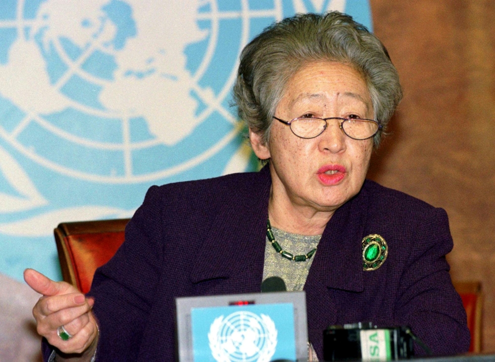 United Nations High Commissioner for Refugees Sadako Ogata gestures during a news conference in Geneva Nov. 20, 1998. - Reuters