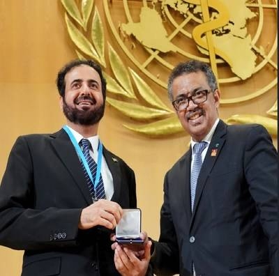 Dr. Tawfiq Al-Rabeeh, minister of health, receives the 'WHO Tobacco Control Medal' from Dr. Tedros Ghebreyesus, director general of the World Health Organization. — Courtesy photo