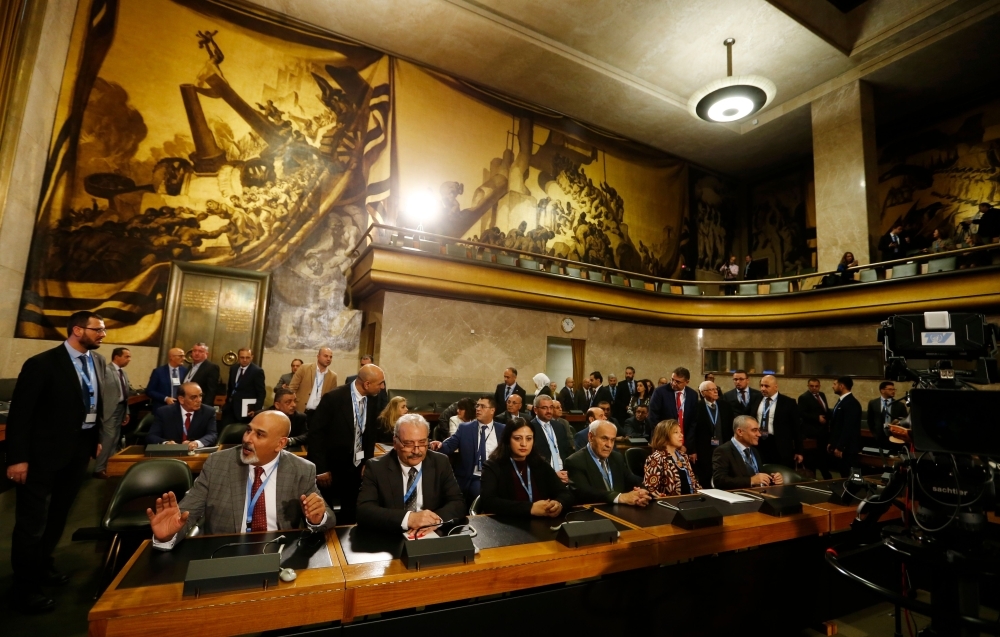 Members of the opposition Syrian Negotiations Commission attend the first meeting of the new Syrian Constitutional Committee at the United Nations in Geneva on Wednesday. — AFP