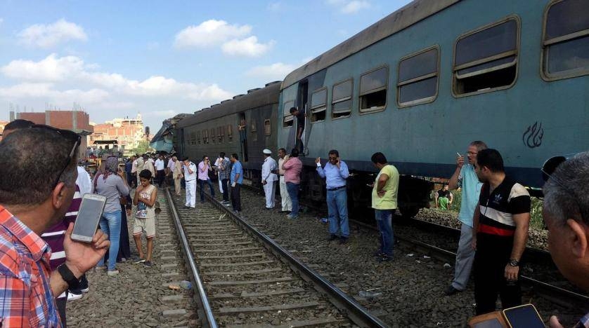 Egyptians look at the crash of two trains that collided near the Khorshid station in Egypt's coastal city of Alexandria, Egypt, in this Aug. 11, 2017 file photo. — Reuters 