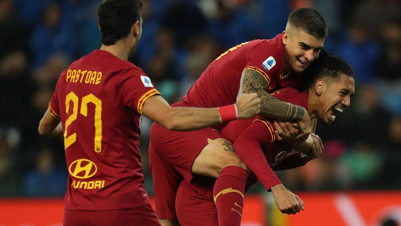 AS Roma celebrate after thumping hapless Udinese 4-0 away in Serie A on Wednesday.