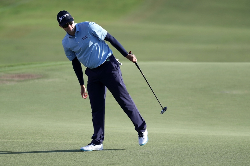 Russell Knox putts on the 18th green during the first round of the Bermuda Championship at Port Royal Golf Course on Thursday in Southampton, Bermuda. — AFP