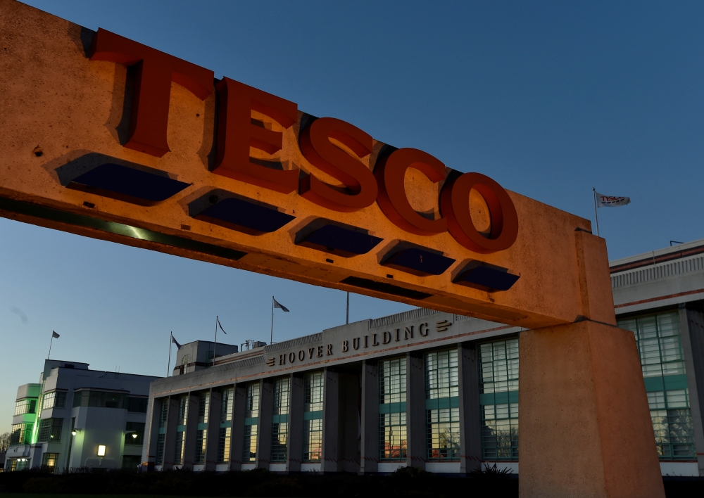 A Tesco supermarket is seen at dusk in an 'art deco' style building at Perivale in west London, Jan. 6, 2015.  — Reuters