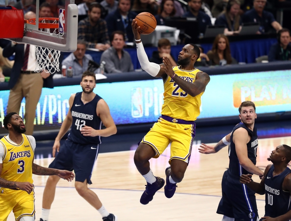 Los Angeles Lakers forward LeBron James (23) dunks during the second half against the Dallas Mavericks at American Airlines Center, Dallas, TX, USA, on Friday. — Reuters