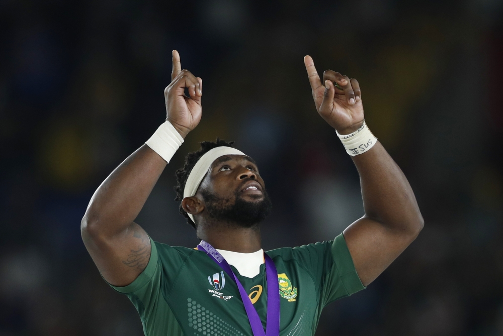 South Africa's Siya Kolisi is presented the Webb Ellis trophy by Japan's Crown Prince Akishino after winning the Rugby World Cup final at International Stadium Yokohama, Yokohama, Japan, on Saturday. — Reuters
