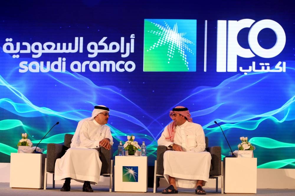Amin H. Nasser, president and CEO of Aramco, and Yasser al-Rumayyan, Saudi Aramco's chairman, at the news conference at the Plaza Conference Center in Dhahran, Saudi Arabia. — Reuters  
