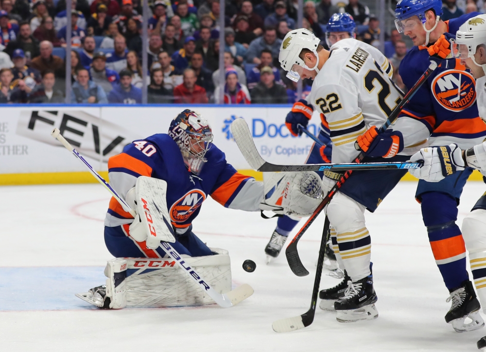 Buffalo Sabres left wing Johan Larsson (22) looks for the puck as New York Islanders goaltender Semyon Varlamov (40) tries to cover the puck during the second period at KeyBank Center, Buffalo, NY, USA, on Saturday. — Reuters