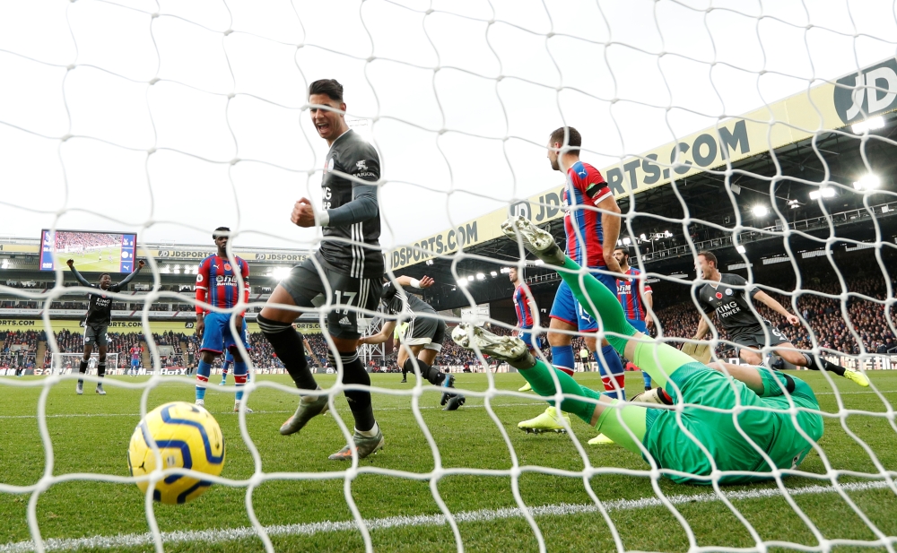 Leicester City's Caglar Soyuncu celebrates scoring their first goal with Ayoze Perez against Crystal Palace at Selhurst Park, London, Britain, on Sunday. — Reuters