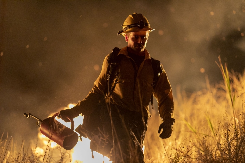 A firefighter uses a drip torch to start a backfire as the Maria Fire explodes to 8,000 acres on its first night near Somis, California, in this Nov. 1, 2019 file photo. — AFP