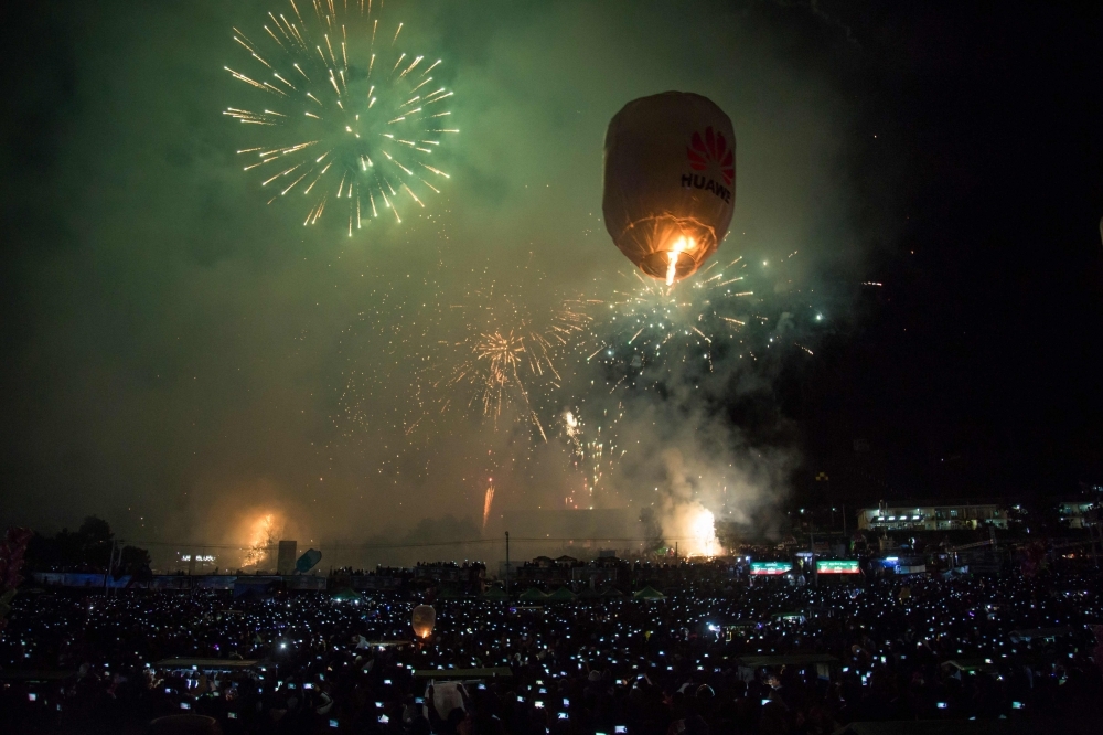 This picture taken on November 4, 2019 shows a hot-air balloon in the sky during the Tazaungdaing Lighting Festival at Taunggyi in Myanmar's northeastern Shan State. -AFP