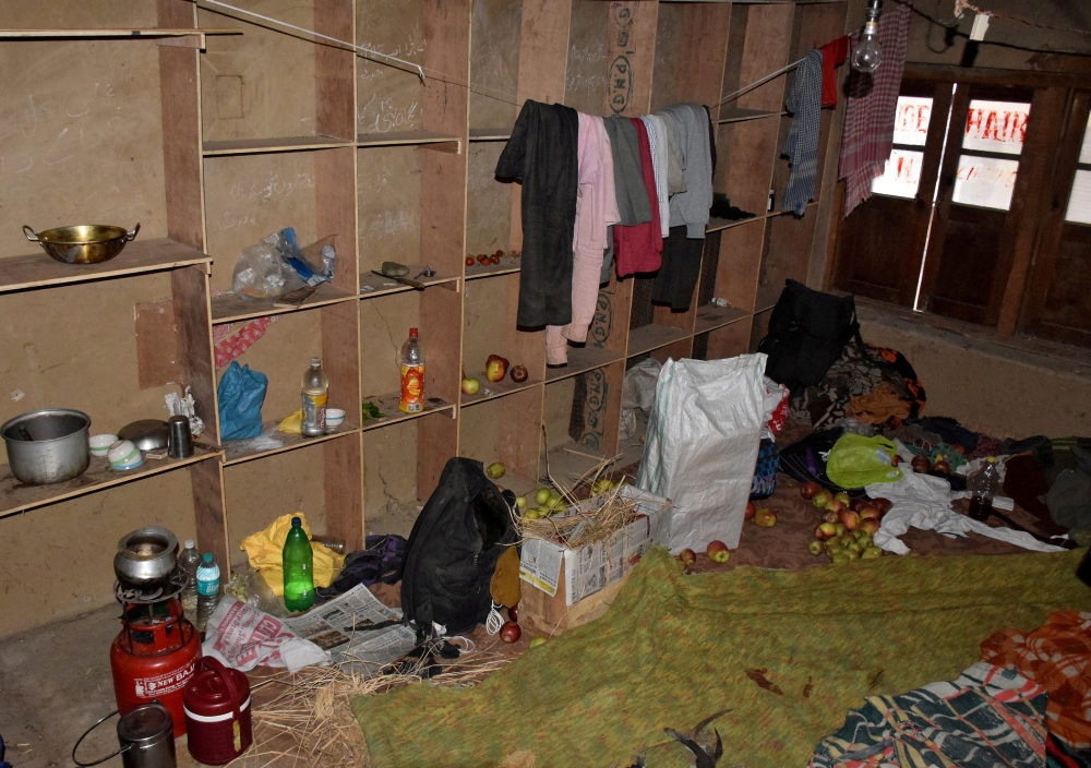 Belongings of laborers, who were killed by unidentified gunmen on Tuesday, are seen inside their rented room in Katrasoo village in south Kashmir's Kulgam district in this Oct. 30, 2019 file photo. — Reuters