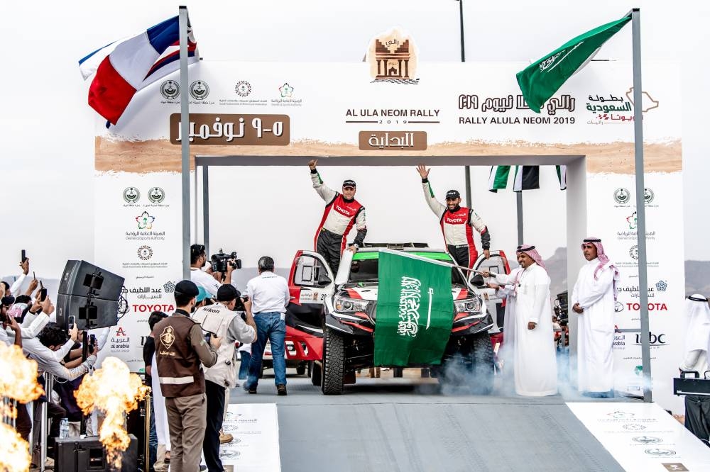 Prince Khalid Bin Sultan Al-Faisal with Fernando Alonso and Abdullah Bakhashab prior to the start of the AlUla–Neom Cross-Country Rally on Tuesday.