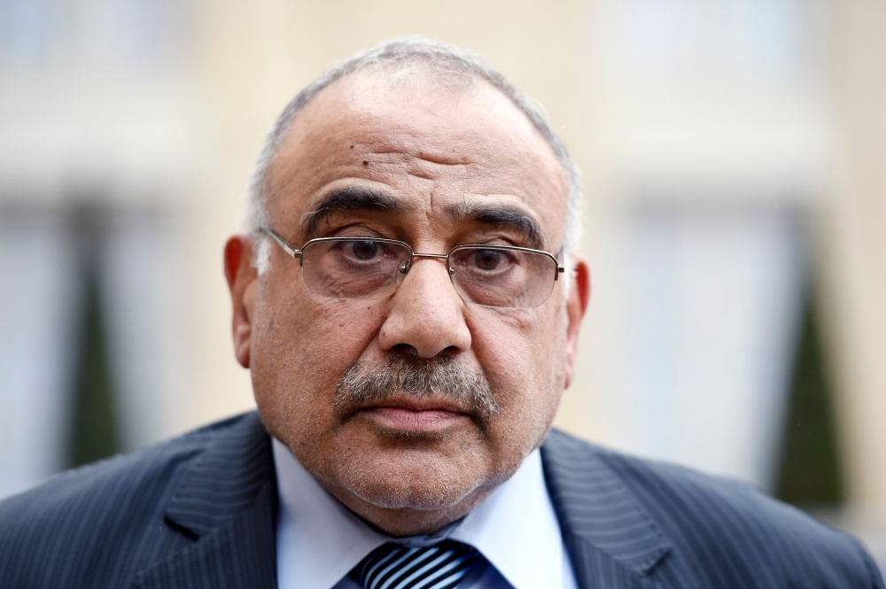 Iraq's Oil Minister Adel Abdel Mahdi listens to questions by the press after a meeting with the French president at the Elysee palace in this April 2, 2015 file photo. — AFP
