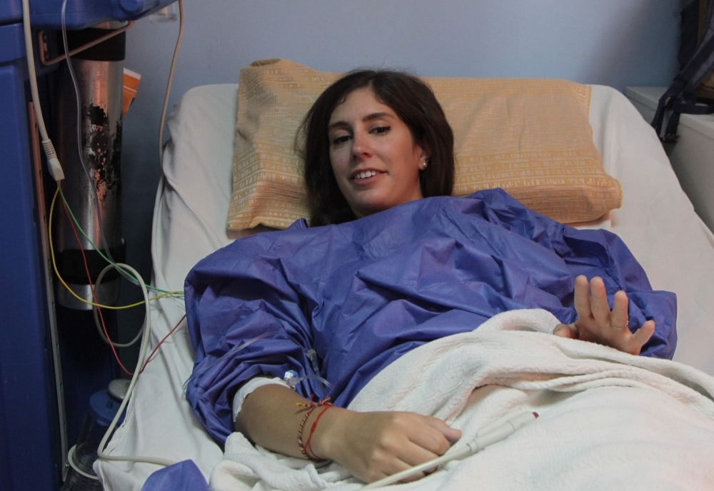 A Swiss woman, wounded during a knife attack at the famed archeological site of Jerash in northern Jordan, is pictured at a government hospital in the ancient town, north of the Jordanian capital Amman, on Wednesday. — AFP