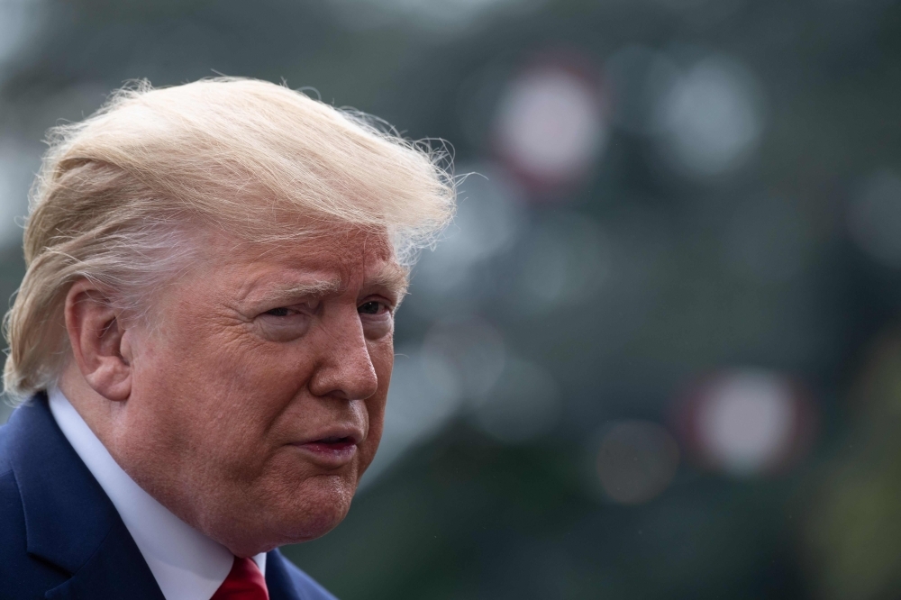 US President Donald Trump speaks to the press before departing the White House in Washington in this Oct. 25, 2019 file photo. Trump on Wednesday said he had hosted successful talks in the White House with representatives of Egypt, Ethiopia and Sudan on a controversial dam being built on the Nile. — AFP