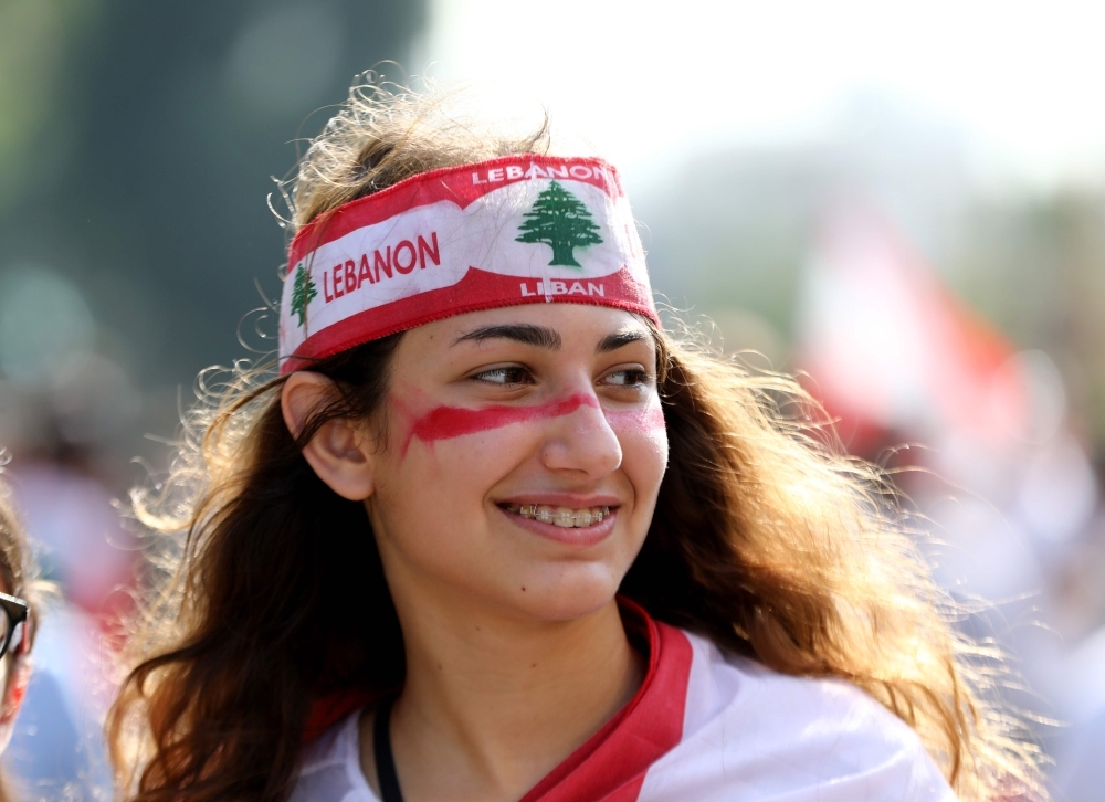 A Lebanese student takes part in an anti-government demonstration in front of the Ministry of Education in the capital Beirut on Thursday. — AFP