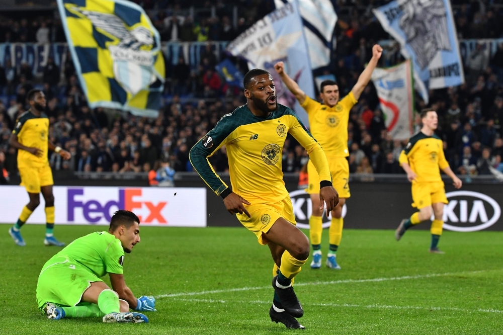 Manchester United's French striker Anthony Martial (C) shoots to score the second goal past FK Partizan's Serbian goalkeeper Vladimir Stojkovic (L) during the UEFA Europa League Group L football match between Manchester United and Partizan Belgrade at Old Trafford in Manchester, north west England, on Thursday. — AFP