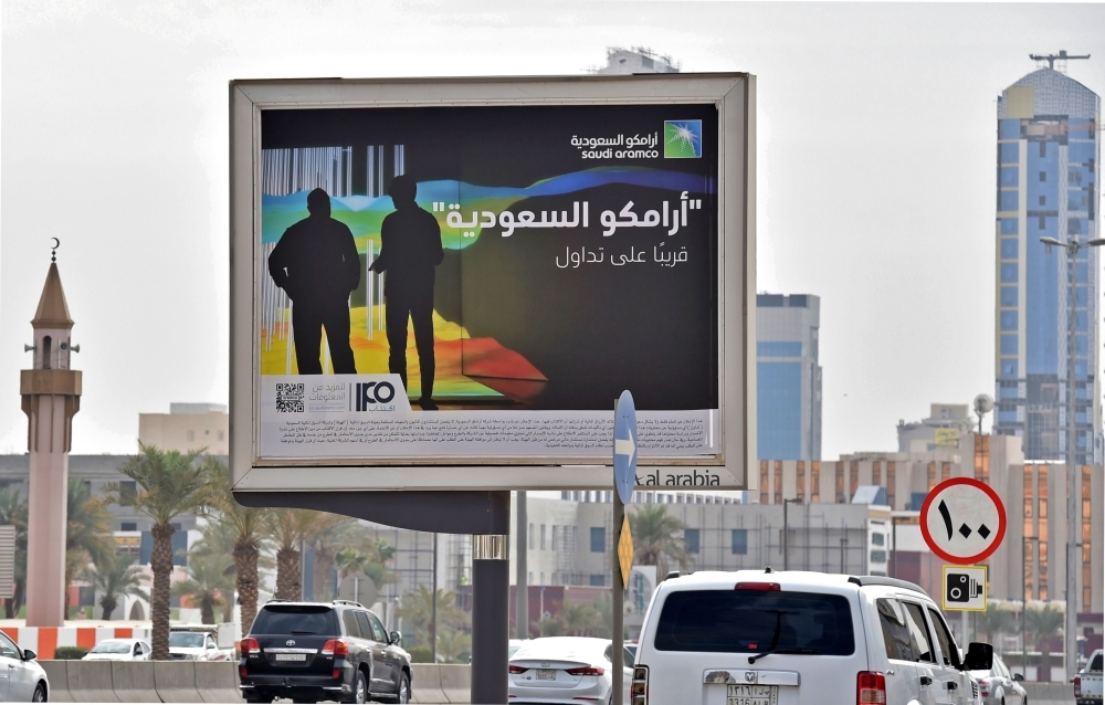 A billboard displaying an advert for Aramco is pictured in the Saudi capital Riyadh on Monday. From robots to sniffer drones, Saudi Aramco has ramped up spending on technological innovation while its rivals cut back amid soft oil prices. — AFP