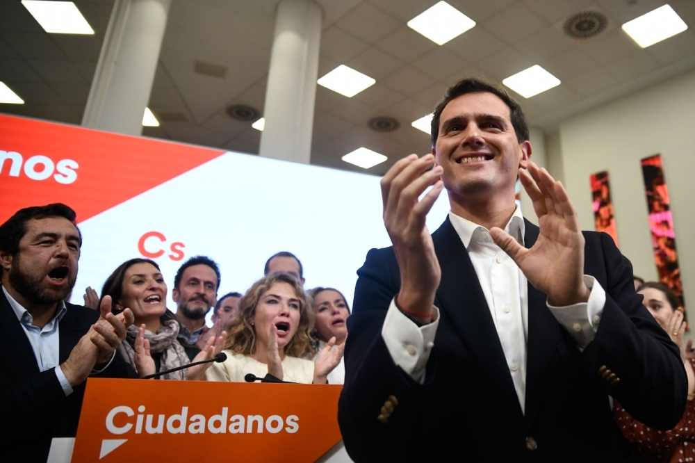 Spanish liberal Ciudadanos party leader and candidate for prime minister, Albert Rivera acknowledges applause after announcing his resignation as party leader on Monday in Madrid, a day after a repeat general election. — AFP
