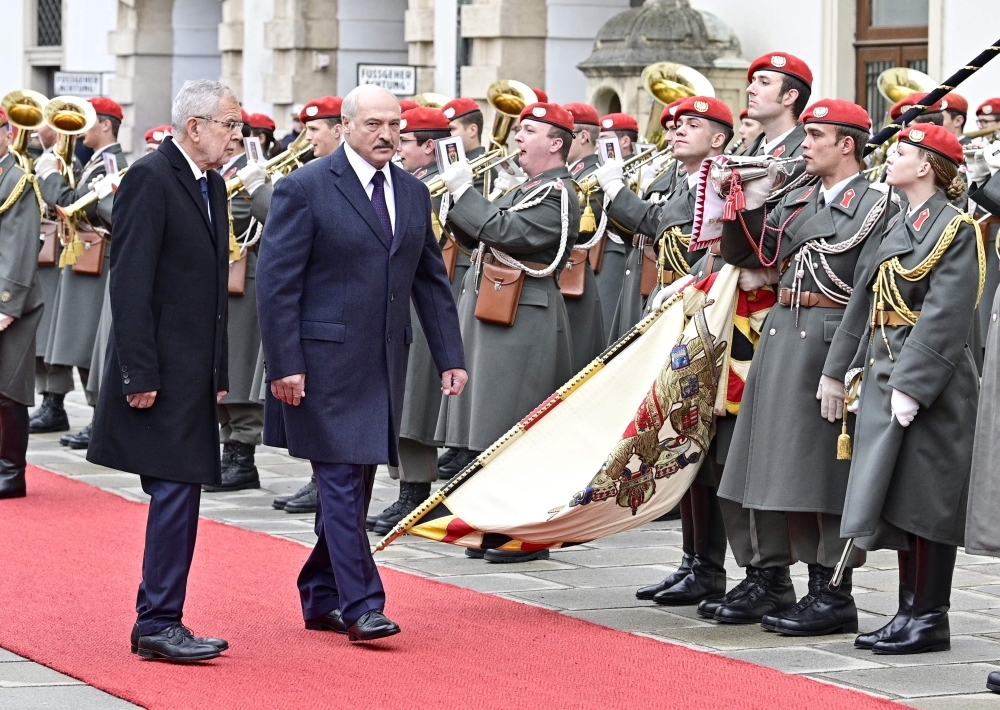 Austria's President Alexander Van der Bellen (R) shakes hands with President of Belarus Alexander Lukashenko before a meeting at Hofburg palace in Vienna, Austria on Tuesday. -AFP