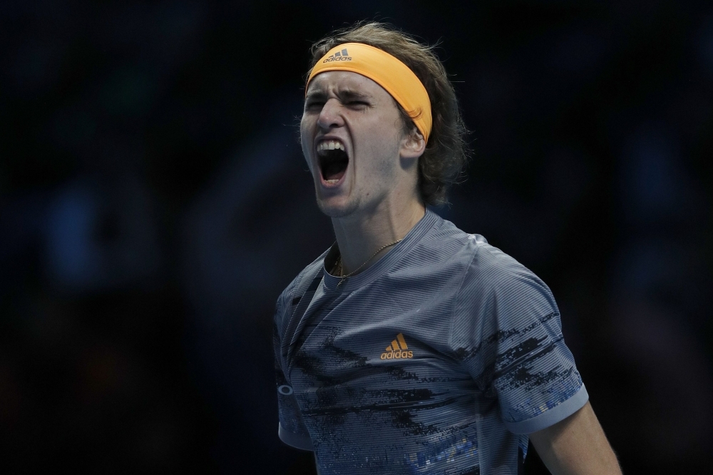 Germany's Alexander Zverev celebrates winning against Spain's Rafael Nadal during their men's singles round-robin match on day two of the ATP World Tour Finals tennis tournament at the O2 Arena in London on Monday. Zverev won 6-2 6-4. — AFP