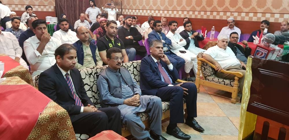 Consul General Khalid Majid addresses an event on Kashmir in Jeddah, Monday. Sardar Ashfaq and Sardar Waqas Inayat are on the dias. — SG photos by Syed Mussarat Khail