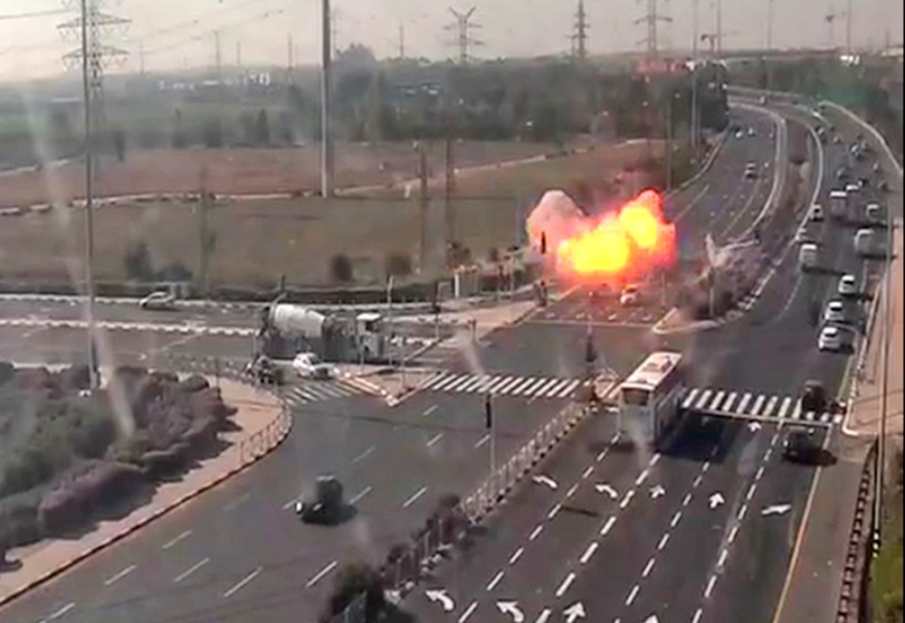 An Israeli missile launched from the Iron Dome defense missile system, designed to intercept and destroy incoming short-range rockets and artillery shells, is pictured in the southern Israeli city of Sderot on Tuesday. -AFP 